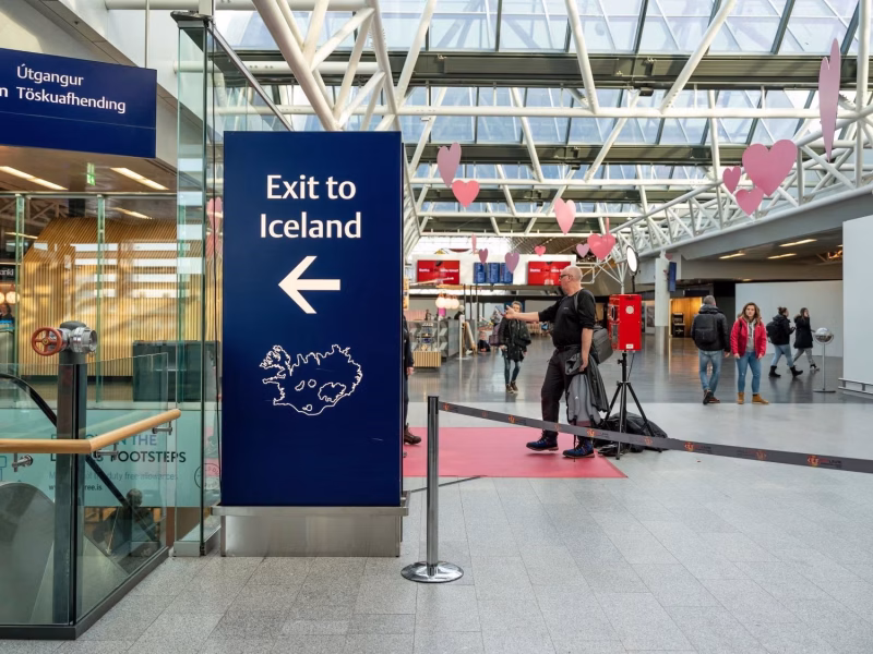 keflavik-airport-flight-sign-people-icelandic-shutterstock-2000px.avif